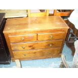 A Pine chest of 2 short and 3 long drawers, brass knob handles.