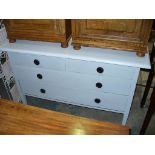 A Painted chest of 2 short and 2 long drawers.
