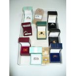 9 Assorted boxed stone set and silver dress rings.