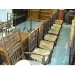 9 Assorted spindle back rush seated country chairs.