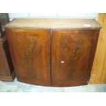 A Victorian flame mahogany bowfront bookcase,