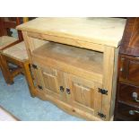 A Modern pine side cabinet with 2 cupboard doors.