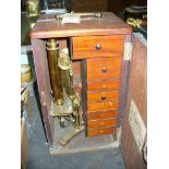 An Early 20th century mahogany cased John B Dancer , Manchester brass students microscope,