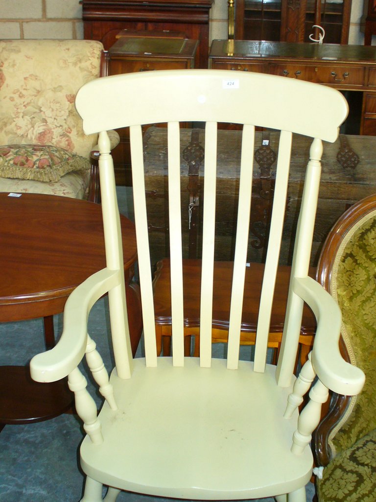 A Painted Windsor farmhouse kitchen elbow chair.