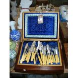 A Cased set of 12 fish knives and forks, canteen of cutlery,