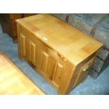 A Small pine panelled blanket chest.
