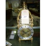 An Early 20th century brass cased lantern clock with a two train Japy Freres movement stamped "Made