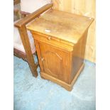 A Victorian satinwood pot cupboard with a single drawer above a cupboard door.