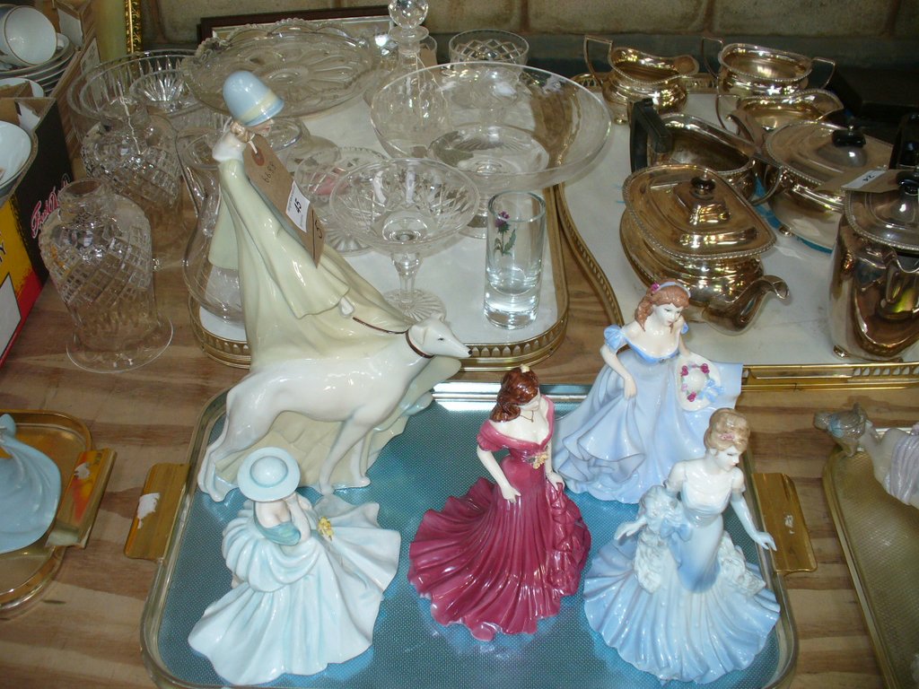 A Royal Doulton figurine " Strolling " ( second ) and 5 Coalport figurines including " Hayley " and