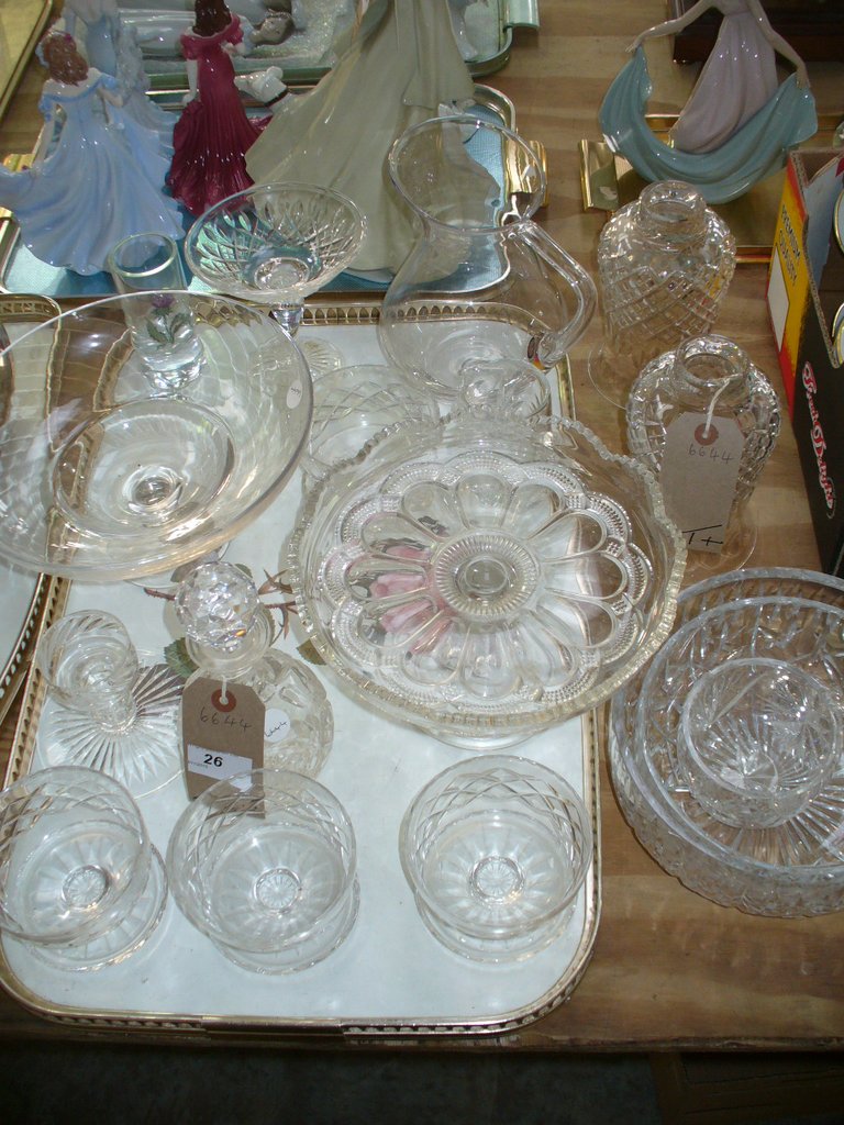 A Qty of glassware including a pair of cut glass bell shaped light shades, fruit bowls, comports,