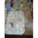 A Qty of glassware including a pair of cut glass bell shaped light shades, fruit bowls, comports,