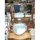 A 19th century inlaid mahogany dressing table mirror with a bow front 3 drawer plinth and an oak
