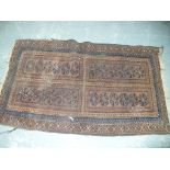 A Persian pattern rug in shades of blue and brown.