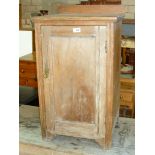 A Victorian pine single door pot cupboard.