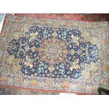 A Rami Persian pattern rug blue ground.