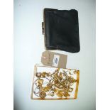 A Collection of gold coloured costume jewellery , chains , earrings and brooches.