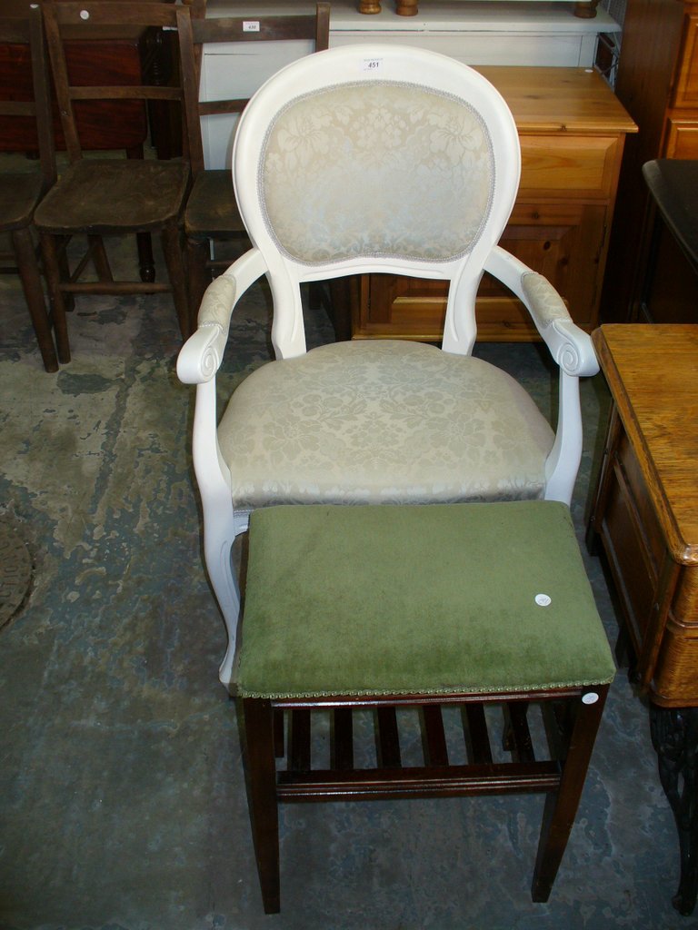 A White French style elbow chair and a Victorian piano stool with a spindle frieze.