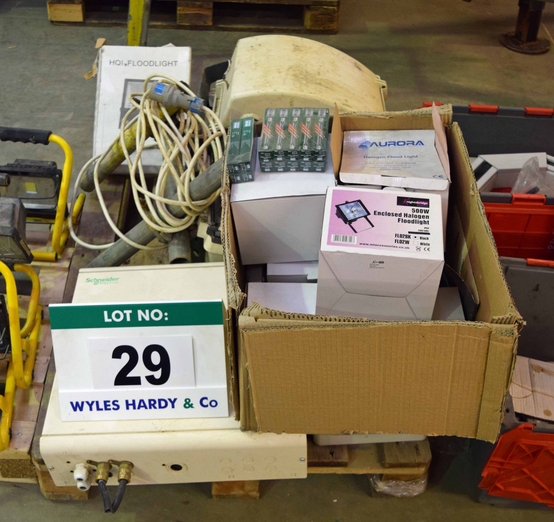 A Pallet of Used Industrial Flood Lighting including Four Industrial Flood Lamps, A Wall mounted