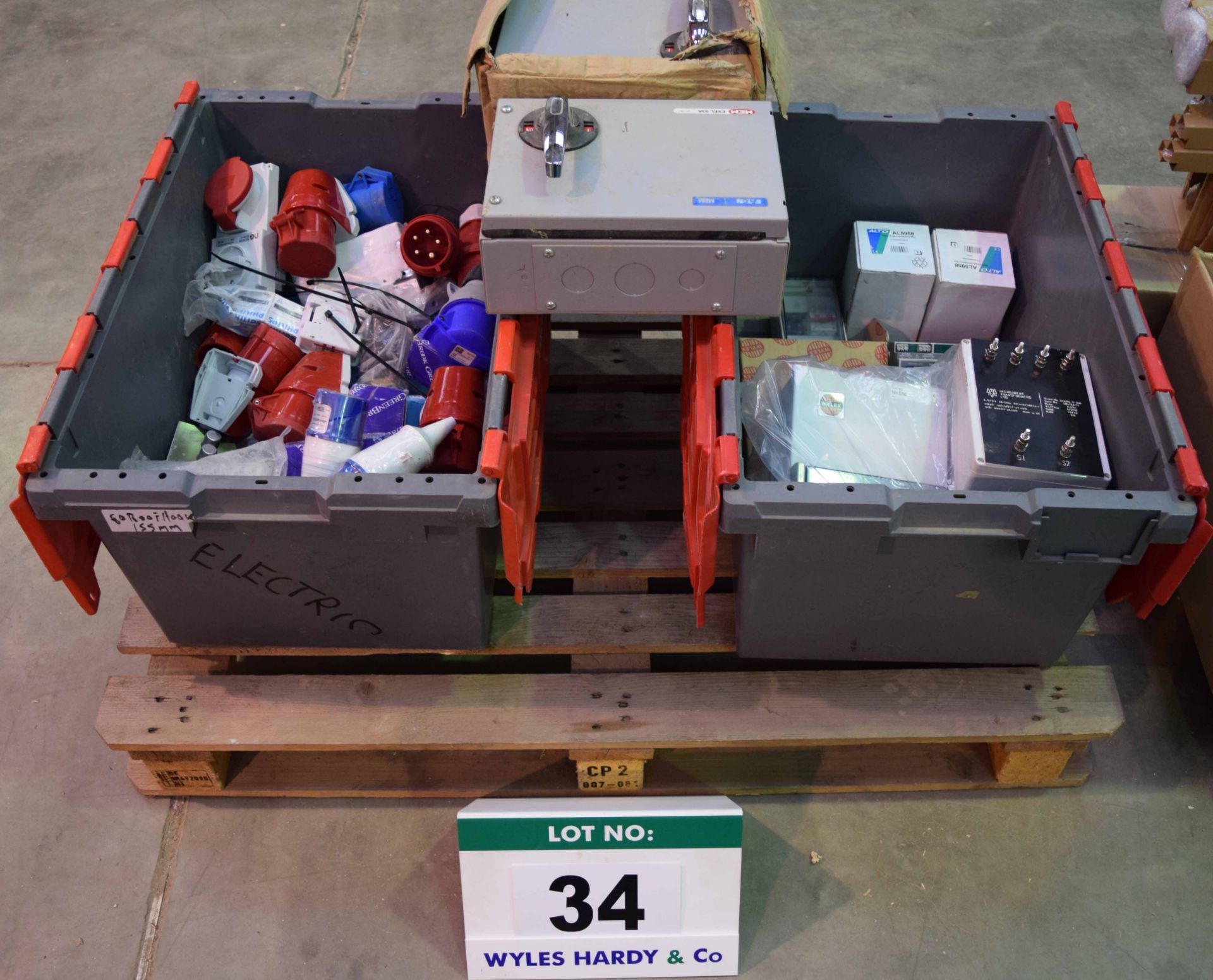 Two Tea Crates containing Single & Three Phase Inline Plugs, Sockets & Isolator Boxes (As