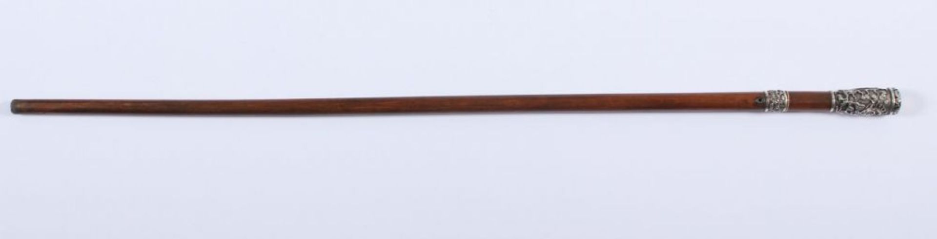 FLANIERSTOCK, Schuss Holz, Manschette und Griff Silber mit reliefierter Darstellung Feuerkugel