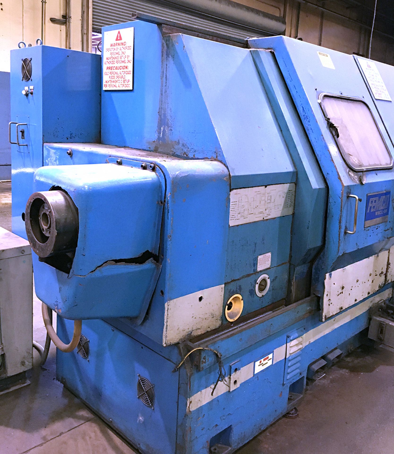 FEMCO WNCL 35/60 CNC LATHE TURNING CENTER w/ FANUC CONTROL + CHIP CONVEYOR - Image 2 of 13