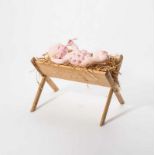 Harma Heikens (Groningen 1963) Child in crib (1993/1994) Painted plaster, wood and straw, H. 48.5