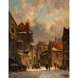 Adrianus Eversen (Amsterdam 1818 - Delft 1897) Figures in the snow-covered village street on a