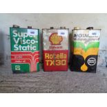 ADVERTISING OIL CANS