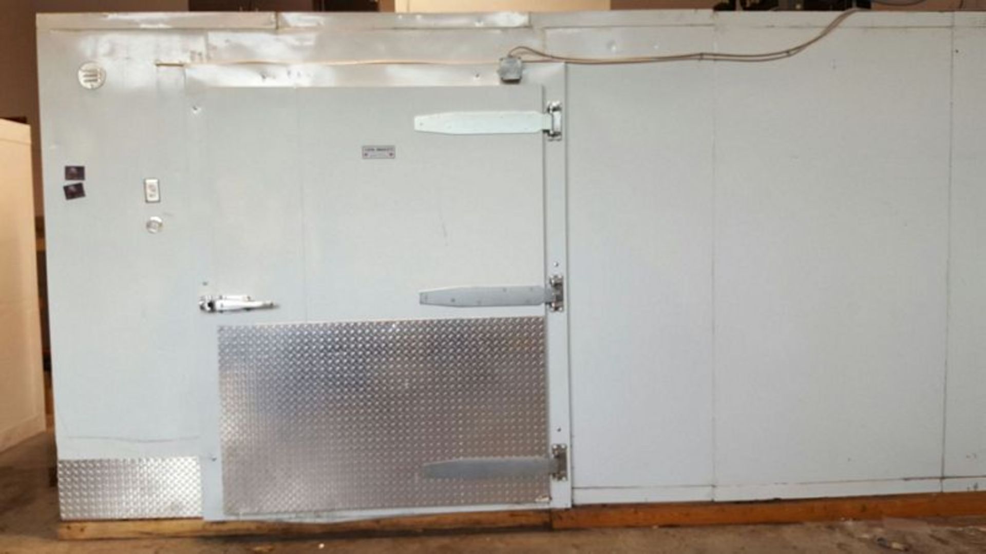 Approx. 8 x 16 walk in freezer complete with pallet door and air cooled refrigeration