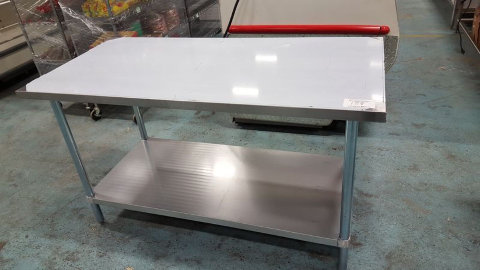 Unused 60 x 30" -  2 tier stainless steel work table