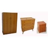 A retro two door wardrobe, width 122cm, a matching chest of four drawers,