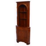 A reproduction corner display cabinet,