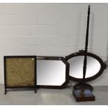 A mahogany standard lamp, a mid 20th century embroidered fire screen, an octagonal wall mirror,