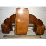 An Art Deco maple double bed with built-in cabinets, width of headboard approx 220 cm.