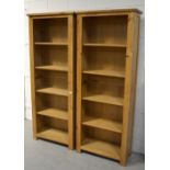 Two contemporary pale oak bookcases,with four shelves to the interior, height 192cm (2).