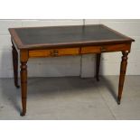 A late 19th century mahogany black leather inset desk with two short drawers above ring turned legs