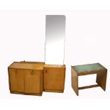 An Art Deco maple dressing table (lacking one of two mirrors),