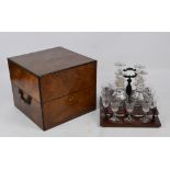 A late 19th century French walnut and string inlaid decanter box with pull-out mahogany stand with