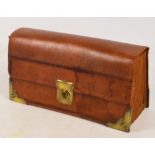 A vintage leather "Diversi" filing case enclosing compartments originally labelled with the