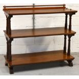 A c.1900 three tier oak buffet with ring turned supports, width 122cm.