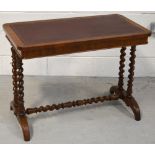 A 19th century rosewood maroon leather inset centre table with barleytwist supports and conjoining