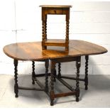 An oak dropleaf gateleg dining table,