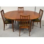 A retro G Plan teak extending oval dining table on tapering legs,