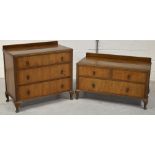 A 20th century chest of three drawers on squat cabriole legs,