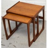 A retro teak nest of two G Plan tables, width of largest 49cm.