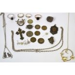 A quantity of silver threepences, white metal cross, a medal, four silver rings,