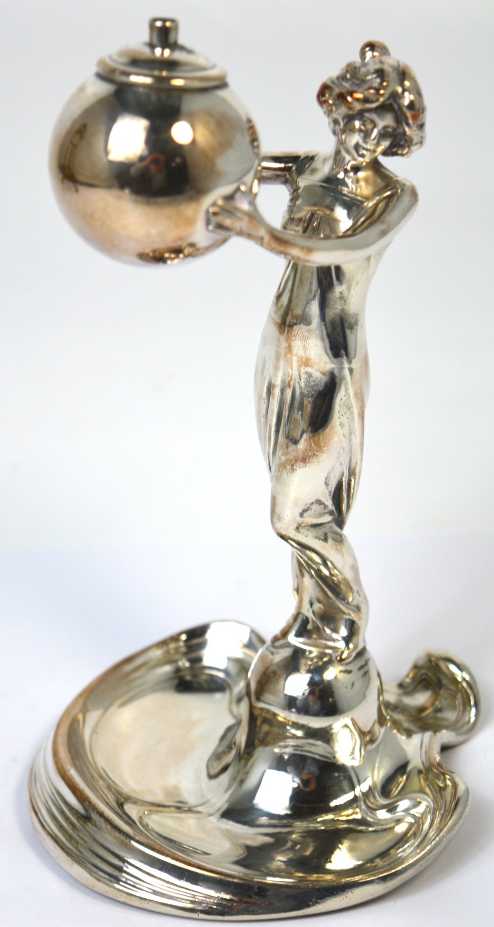 A WMF figurine of an Art Deco lady holding a ball, approx 20cm.