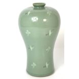 A 20th century Japanese crackle glaze baluster vase decorated with cranes with character marks to