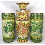 A near pair of Oriental inspired green sleeve type vases,