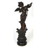 A spelter figure of a young girl with wings playing a violin on rounded ebonised base with plaque